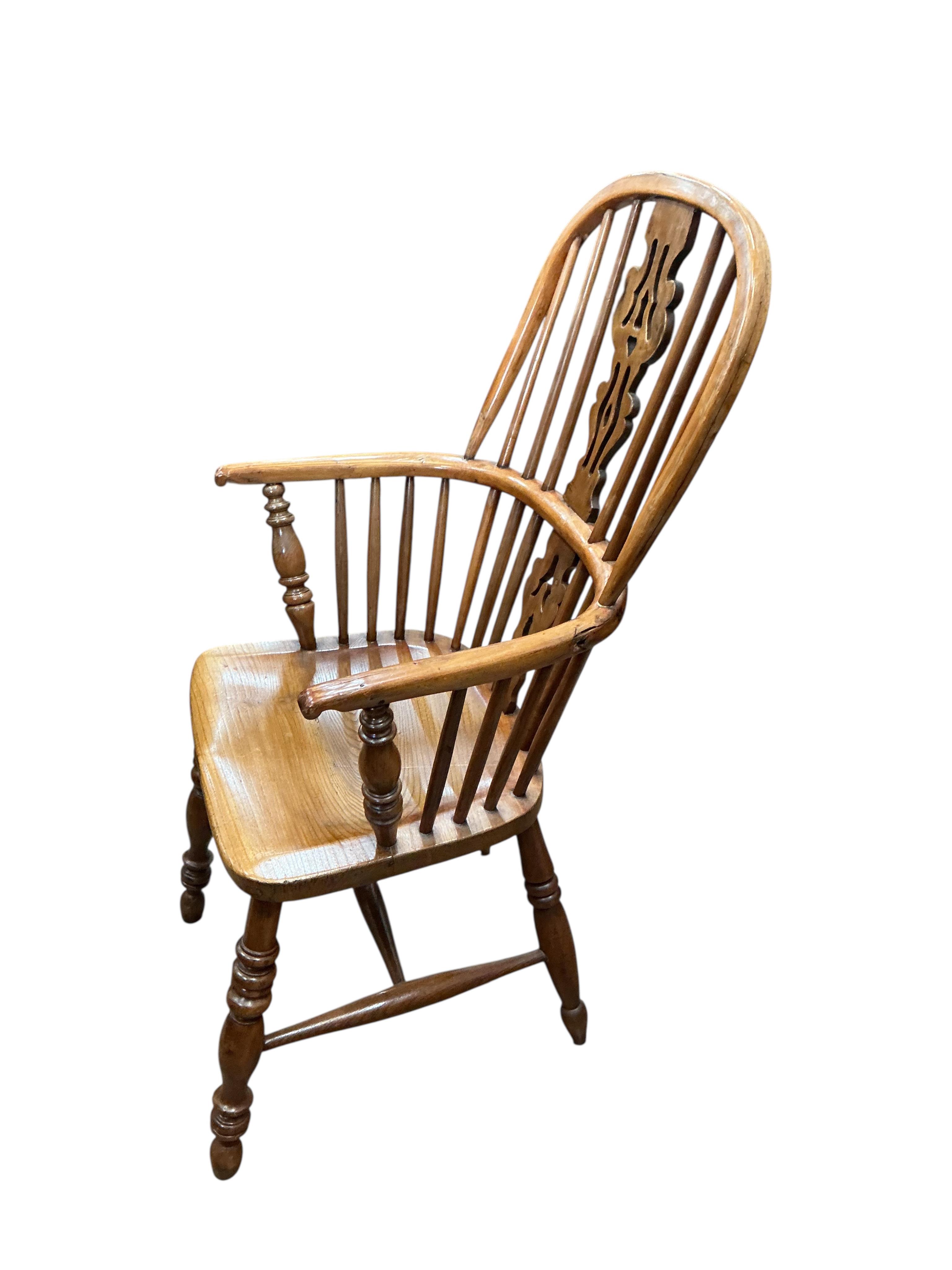 A mid 19th century yew and elm Windsor armchair in the manner of Gabbitass, Worksop, width 60cm, depth 41cm, height 105cm